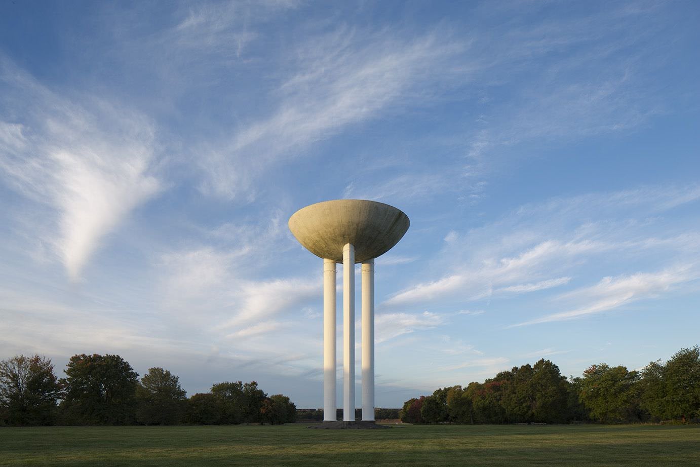 The Bell Works water tower against a blue sky